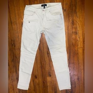 Mint green skinny moto jeans